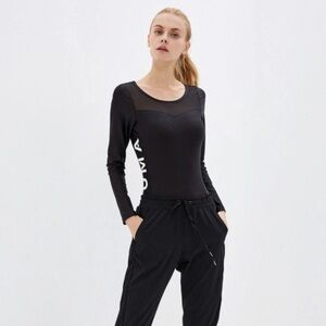 Puma XTG Sweetheart Mesh Panel Logo Bodysuit in Black Women’s Small